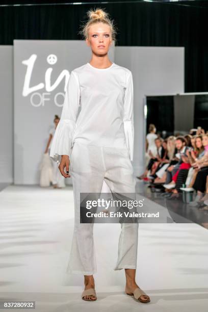 Model walks the runway at the Line Of Oslo show during the Fashion Week Oslo Spring/Summer 2018 on August 22, 2017 in Oslo, Norway.