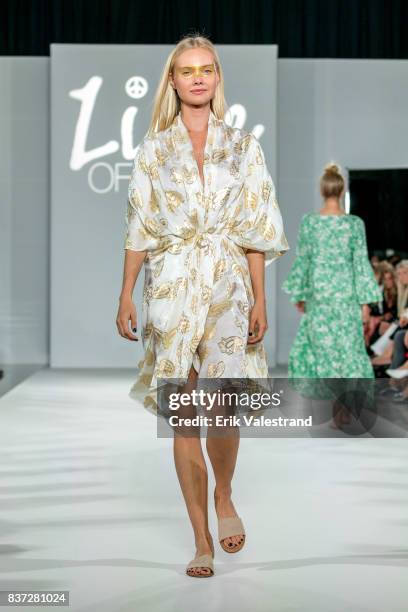 Model walks the runway at the Line Of Oslo show during the Fashion Week Oslo Spring/Summer 2018 on August 22, 2017 in Oslo, Norway.