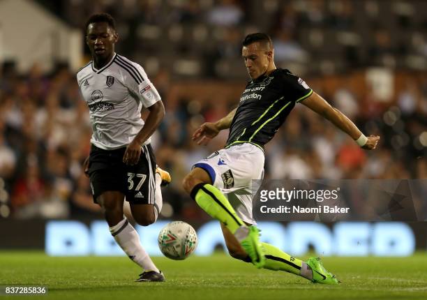 Billy Bodin of Bristol Rovers goes past Tayo Edun of Fulham during the Carabao Cup Second Round match between Fulham and Bristol Rovers at Craven...