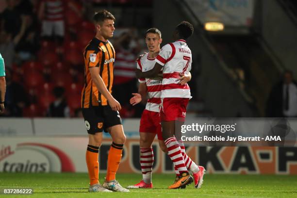 Tommy Rowe of Doncaster Rovers celebrates after scoring a goal to make it 2-0 during the Carabao Cup Second Round match between Doncaster Rovers and...