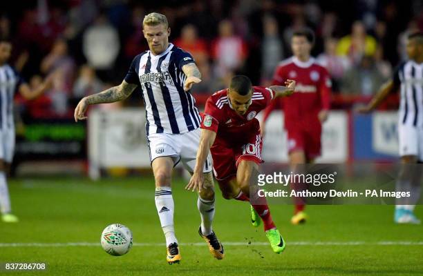Accrington Stanley's Kayden Jackson is tackled by West Bromwich Albion's James McClean during the Carabao Cup, Second Round match at the Wham...