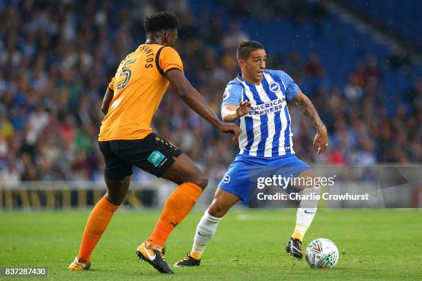 Ricardo Santos of Barnet puts pressure on Anthony Knockaert of Brighton and Hove Albion during the Carabao Cup Second Round match between Brighton &...