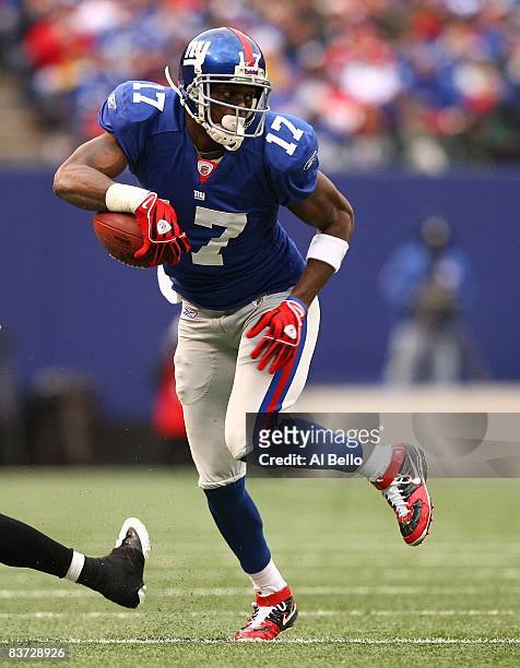 Plaxico Burress of the New York Giants in action against the Baltimore Ravens during their game on November 16, 2008 at Giants Stadium in East...
