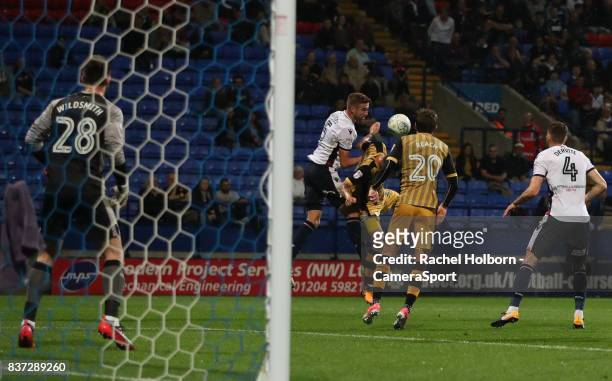 Bolton Wanderers' Dorian Dervite scores his side's first goal during the Carabao Cup Second Round match between Bolton Wanderers and Sheffield...
