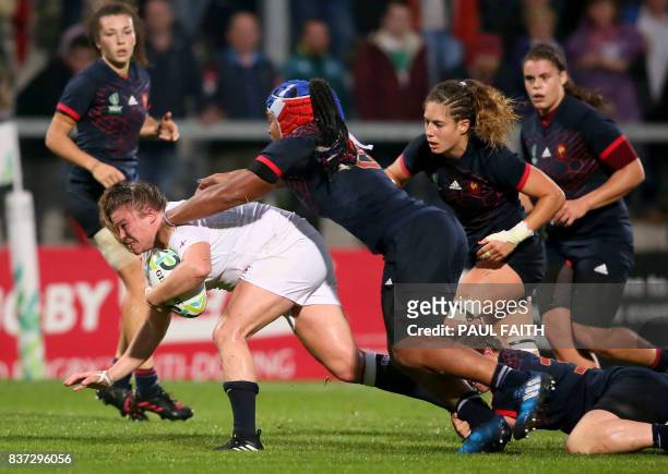 England's Sarah Bern is tackled by France's Safi N'Diaye during the Women's Rugby World Cup 2017 semi-final match between England and France at The...