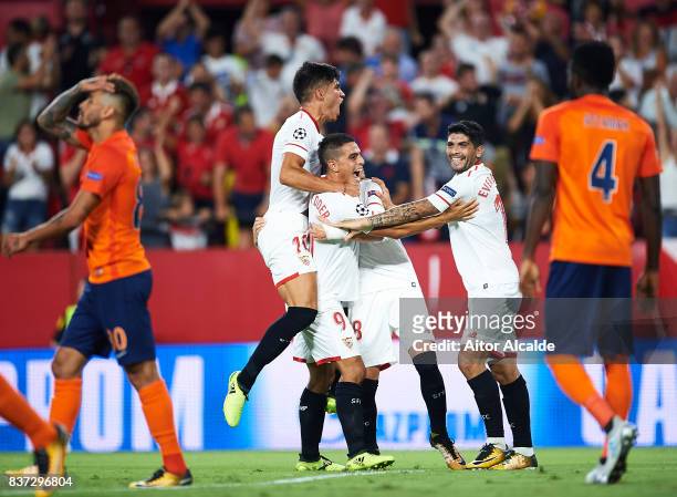 Sergio Escudero of Sevilla FC celebrates after scoring with his team mates Wissam Ben Yedder Joaquin Correa and Ever Banega during the UEFA Champions...