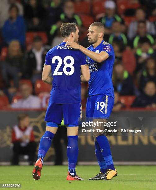 Leicester City's Islam Slimani celebrates scoring his side's second goal of the game with team mate Leicester City's Christian Fuchs during the...
