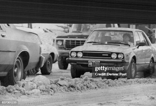 Driving was slow around 900 block of Lincoln Street in Denver as Chilling temperatures that moved into area Tuesday made roads icy in Spoto. Credit:...