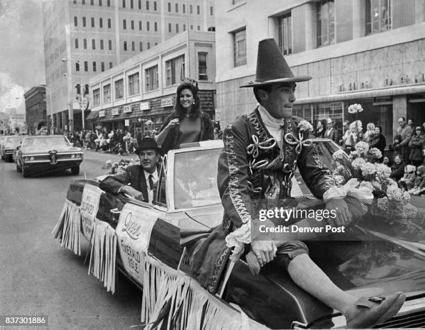 Queen, Leprechaun Lead St. Patrick Fete Miss Vicki Hissong Queen of the Emerald Isle, rides in her official car near the front of Denver's St....