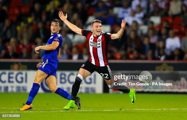 Leicester City's Ben Chillwell and Sheffield United's Caolan Lavery battle for the ball during the Carabao Cup, Second Round match at Bramall Lane,...