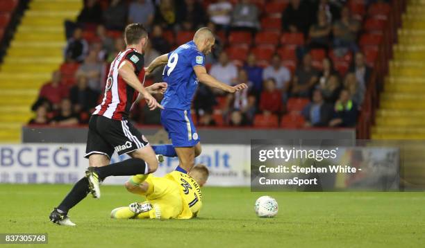 Leicester City's Islam Slimani rounds Sheffield United's goalkeeper Jake Eastwood to score his sides second goal during the Carabao Cup Second Round...