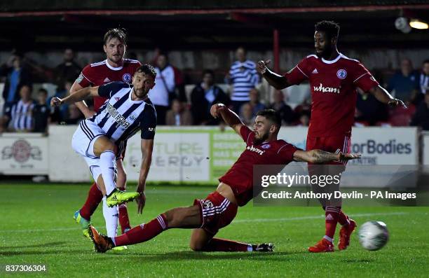 West Brom's Jay Rodriguez scores the third goal during the Carabao Cup, Second Round match at the Wham Stadium, Accrington.