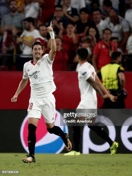 Sergio Escudero of Sevilla celebrates after scoring a goal during the UEFA Champions League play-off match between Sevilla and Medipol Basaksehir at...