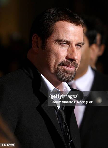 Actor John Travolta arrives at the premiere of Walt Disney Animation Studios' "Bolt" held at the El Capitan Theatre on November 17, 2008 in...