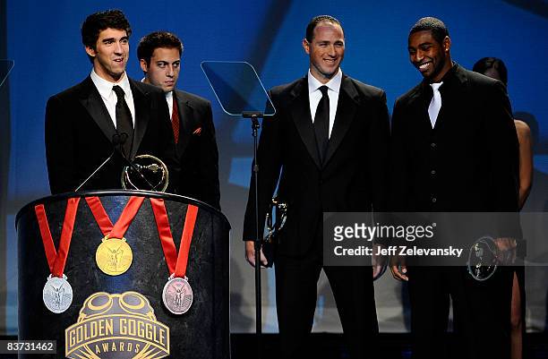 Michael Phelps , Garrett Weber-Gale , Jason Lezak , and Cullen Jones accept the Golden Goggles Award for relay performance of the year at the fifth...