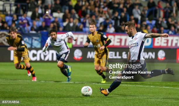 Bolton Wanderers' Adam Armstrong scores their second goal from the penalty spotduring the Carabao Cup Second Round match between Bolton Wanderers and...