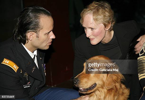 Iraq veteran Luis Montalvan and actress Glenn Close attend the Puppies Behind Bars celebration titled Dog Tags: Service Dogs For Those Who've Served...