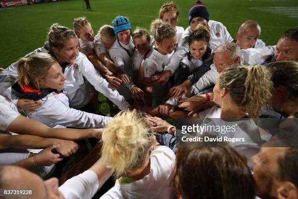 England players and coaching staff celebrate following their team's 20-3 victory during the Women's Rugby World Cup 2017 Semi Final match between...