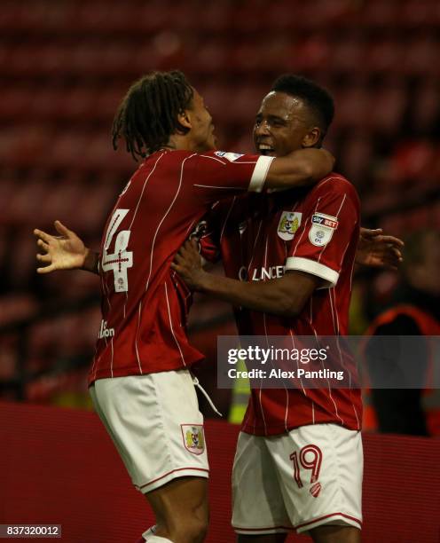 Niclas Eliasson of Bristol City celebrates scoring the third goal with Bobby Reid during the Carabao Cup Second Round match between Watford and...