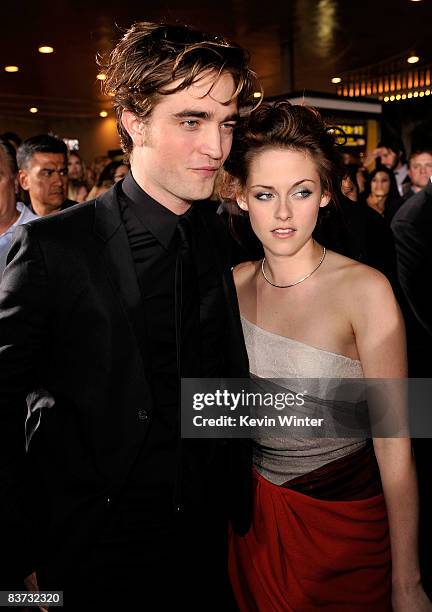 Actor Robert Pattinson and actress Kristen Stewart arrive at the film premiere of Summit Entertainment's "Twilight" held at the Mann Village and...