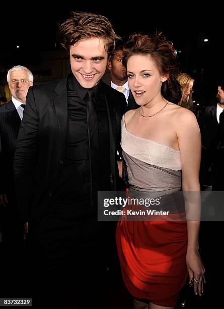 Actor Robert Pattinson and actress Kristen Stewart arrive at the film premiere of Summit Entertainment's "Twilight" held at the Mann Village and...