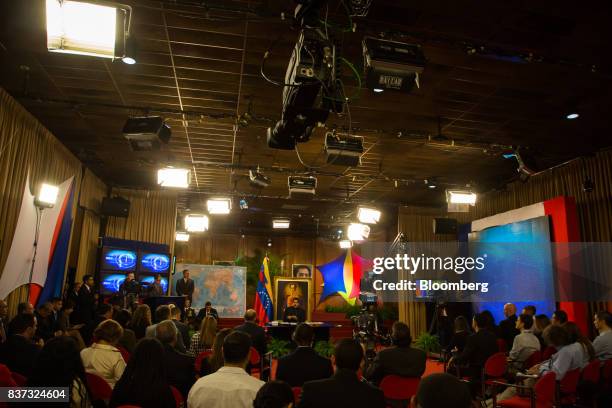 Members of the international media sit while Nicolas Maduro, Venezuela's president, speaks during a news conference in Caracas, Venezuela, on...