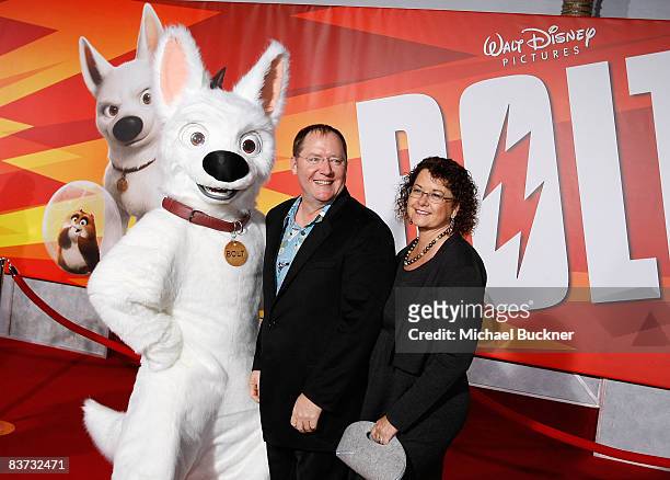 Producer John Lasseter and guest arrive at the premiere of Walt Disney Animation Studios' "Bolt" held at the El Capitan Theatre on November 17, 2008...