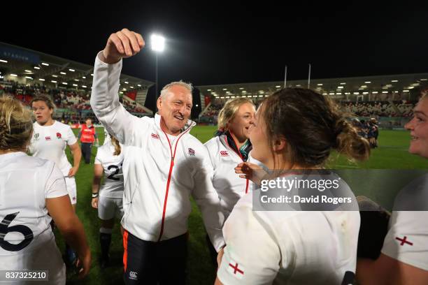 Simon Middleton the head coach of England celebrates with his players following their team's 20-3 victory during the Women's Rugby World Cup 2017...