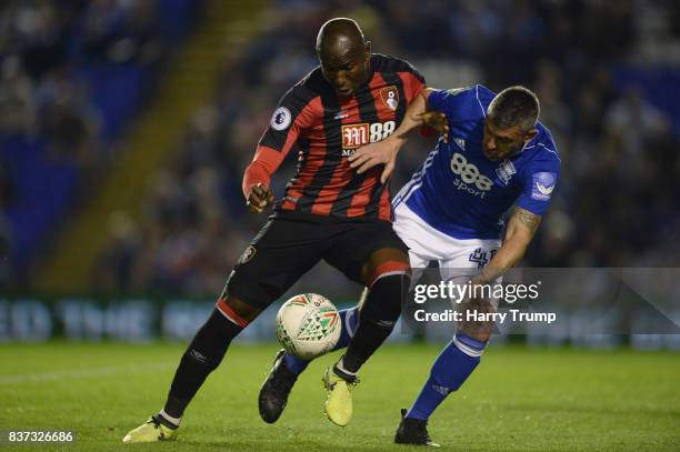 Benik Afobe of AFC Bournemouth and Paul Robinson of Birmingham City battle for possession during the Carabao Cup Second Round match between...