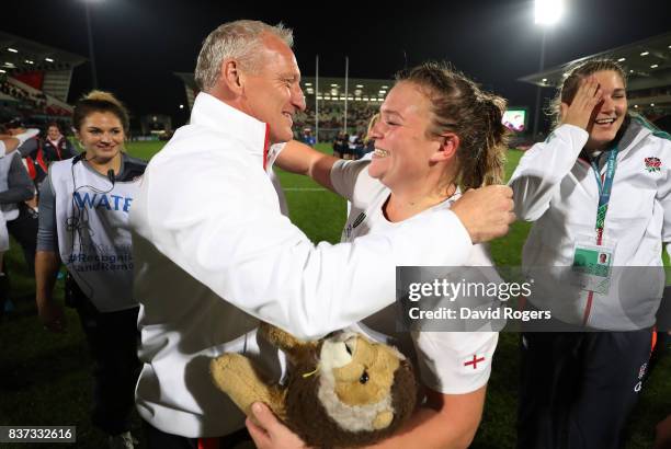 Simon Middleton the head coach of England congratulates player of the match, Sarah Bern of England following their team's 20-3 victory during the...