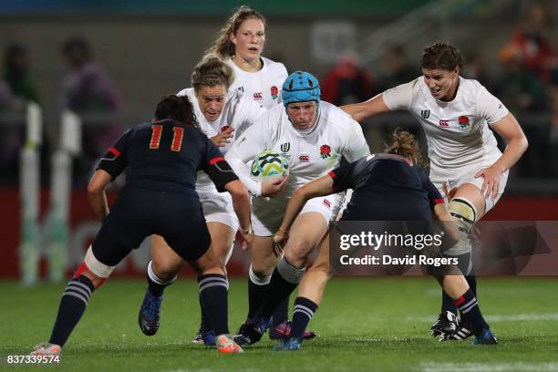 Rochelle Clark of England charges upfield during the Women's Rugby World Cup 2017 Semi Final match between England and France at the Kingspan Stadium...