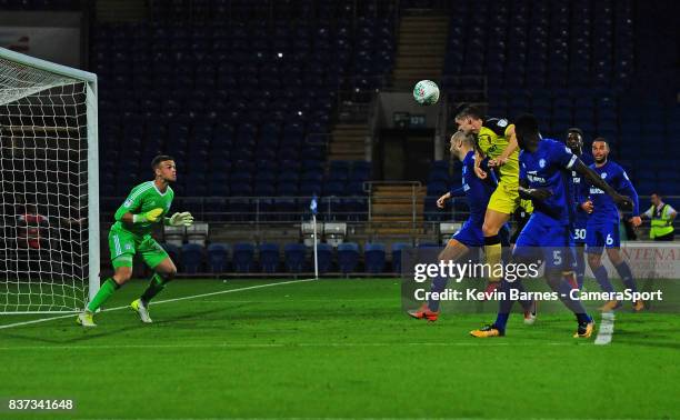 Burton Albion's Ben Fox scores his sides second goal during the Carabao Cup Second Round match between Cardiff City and Burton Albion at Cardiff City...