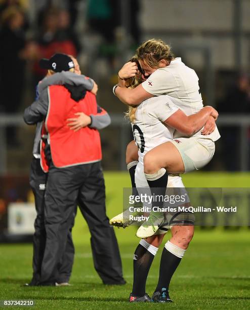 England players celebrate after the Womens Rugby World Cup semi-final between England and France at the Kingspan Stadium on August 22, 2017 in...