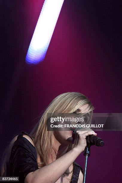 French singer Barbara Carlotti performs during the newcomers Constantin music award at the Olympia music-hall in Paris, on November 17, 2008....