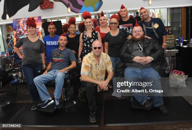 Actor Michael Rooker posese with fans with Yondu mohawks at Disney's Celebration for the Release Of "Guardians Of The Galaxy Vol. 2" Blu-ray held at...