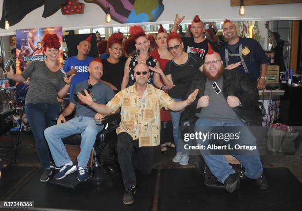Actor Michael Rooker posese with fans with Yondu mohawks at Disney's Celebration for the Release Of "Guardians Of The Galaxy Vol. 2" Blu-ray held at...