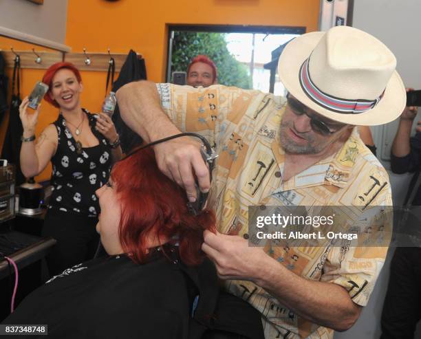 Actor Michael Rooker gives a fan a Yondu mohawk at Disney's Celebration for the Release Of "Guardians Of The Galaxy Vol. 2" Blu-ray held at Shorty's...