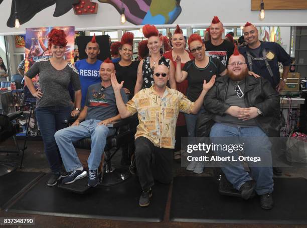 Actor Michael Rooker posese with fans with Yondu mohawks at Disney's Celebration for the Release Of "Guardians Of The Galaxy Vol. 2" Blu-ray held at...