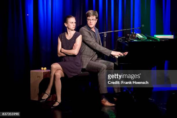 German singer Melanie Haupt and Bodo Wartke perform live on stage during a concert at the BKA Theater on August 22, 2017 in Berlin, Germany.