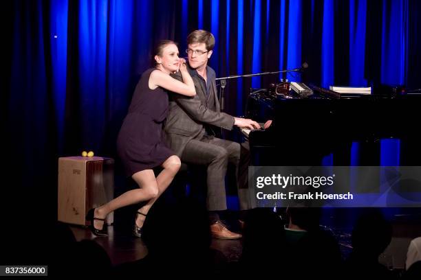 German singer Melanie Haupt and Bodo Wartke perform live on stage during a concert at the BKA Theater on August 22, 2017 in Berlin, Germany.