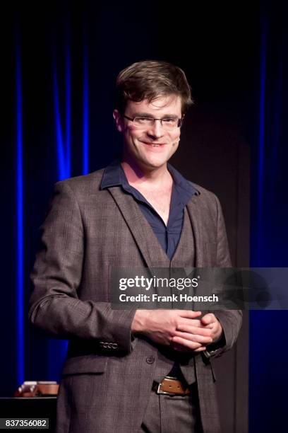 German singer and comedian Bodo Wartke performs live on stage during a concert at the BKA Theater on August 22, 2017 in Berlin, Germany.