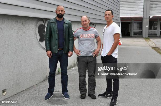 Anton Noori, Roland Dueringer and Laurence Rupp pose during a set visit for 'Cops' at Dusika Stadion on August 22, 2017 in Vienna, Austria.