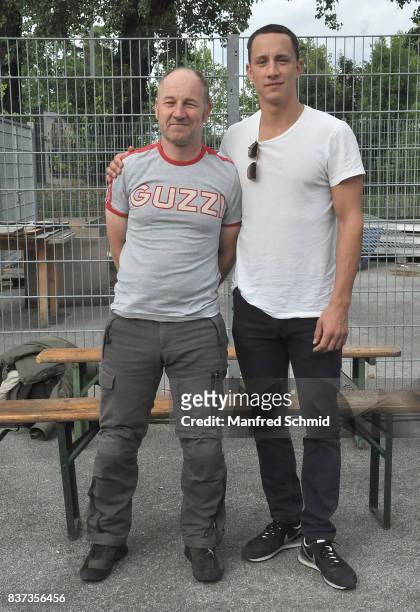 Roland Dueringer and Laurence Rupp pose during a set visit for 'Cops' at Dusika Stadion on August 22, 2017 in Vienna, Austria.