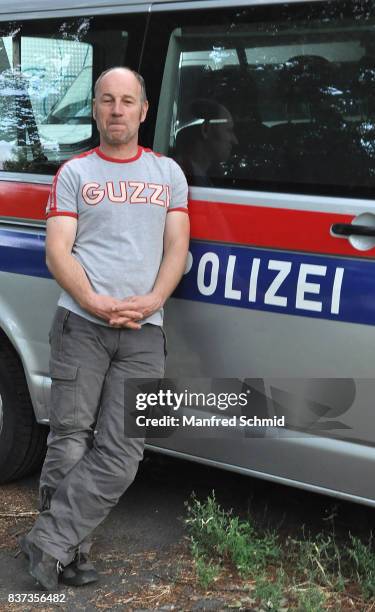 Roland Dueringer poses during a set visit for 'Cops' at Dusika Stadion on August 22, 2017 in Vienna, Austria.