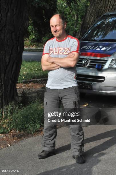 Roland Dueringer poses during a set visit for 'Cops' at Dusika Stadion on August 22, 2017 in Vienna, Austria.