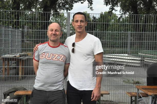 Roland Dueringer and Laurence Rupp pose during a set visit for 'Cops' at Dusika Stadion on August 22, 2017 in Vienna, Austria.