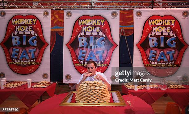 Denzil Gunner from London celebrates his win of eating 41 mince pies during the Wookey Hole Big Eat 2008, the annual mince pie eating contest, at the...
