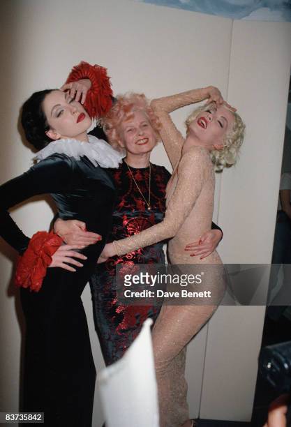Fashion designer Vivienne Westwood with two models during London Fashion Week, March 1992.
