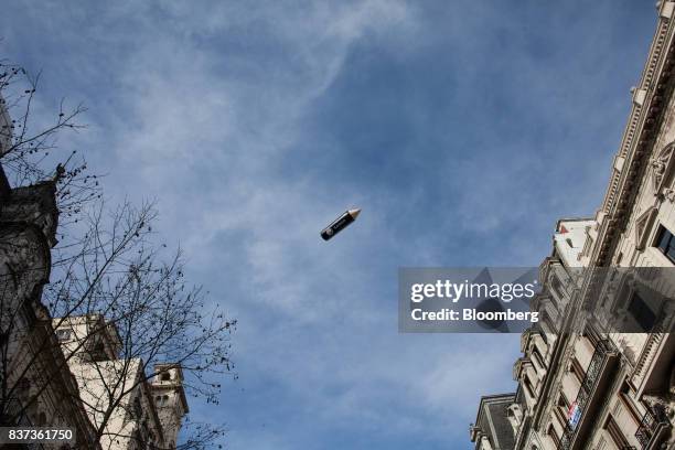 Blimp flies in the sky during a protest in Buenos Aires, Argentina, on Tuesday, Aug. 22, 2017. Union groups protested Argentinean President Mauricio...