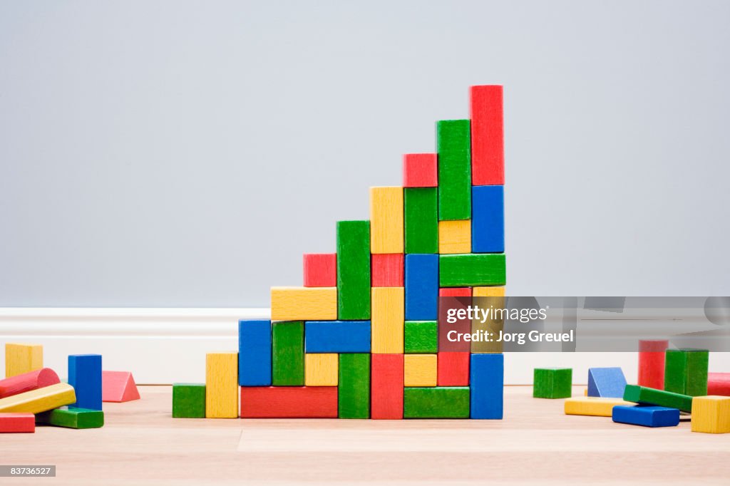 Multicolored building blocks in stairs shape